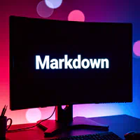 Computer screen with the word Markdown and a red arrow pointing down